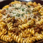 Cheesy Garlic Twisted Pasta with Cajun Ground Beef and Alfredo Velveeta 1