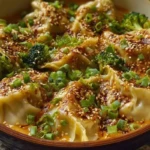 Oven-Baked Dumplings with Peanut Sauce